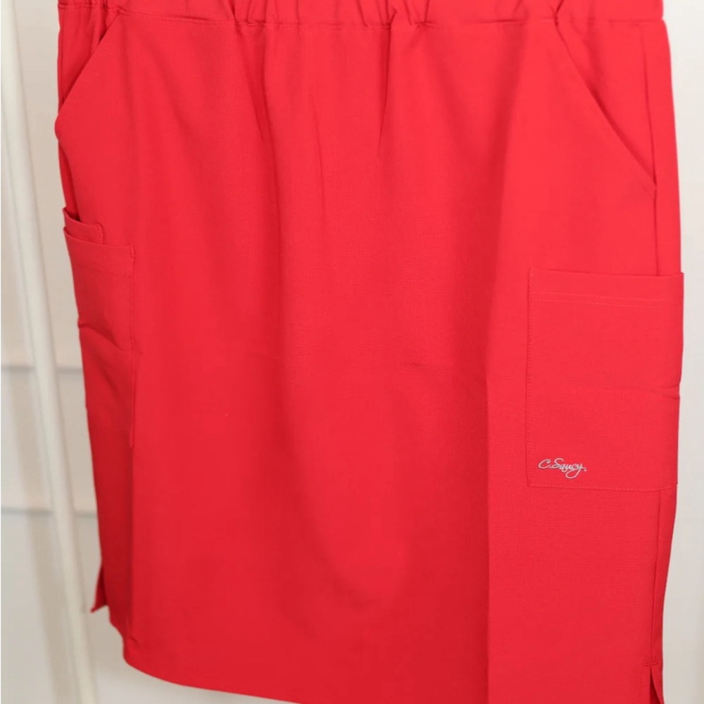 C. Saucy Vibrant Red Scrub Skirt. XS but fits like small.